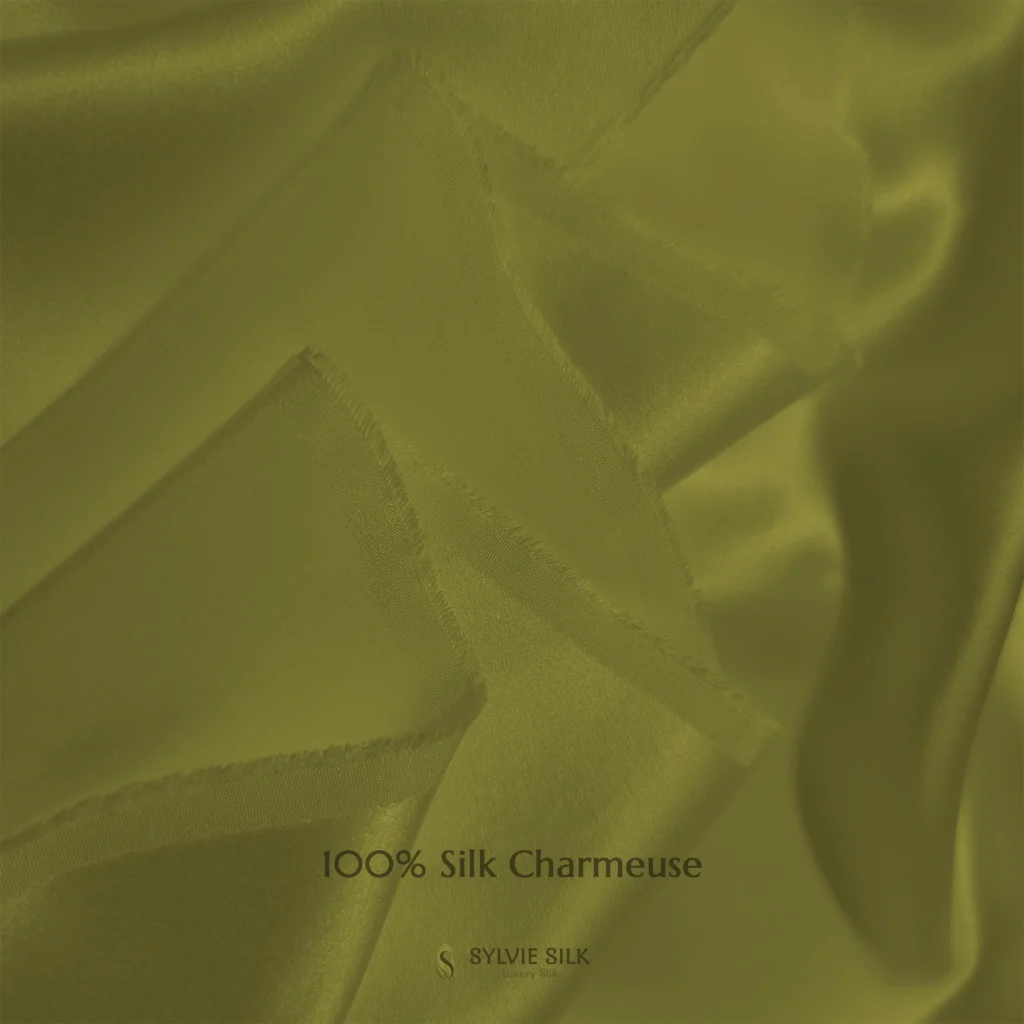 Parakeet Green 100% silk charmeuse fabric with luminous folds and a smooth lustrous face
