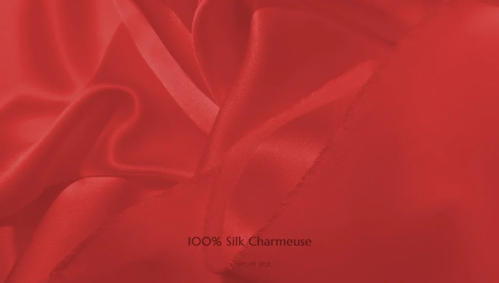 100% silk charmeuse fabric with a smooth lustrous face red color